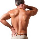 Man with back pain | Featured image for the Back Injury Physiotherapy service page at Pivotal Motion.