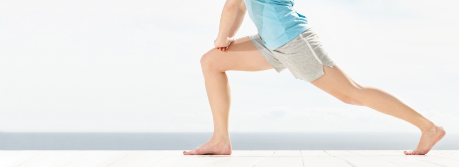 Photo of a person performing a leg stretch | featured image for Pivotal Motion Physiotherapy Improving Range of Motion blog for Pivotal Motion Physiotherapy.