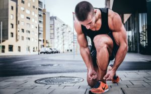 Runner ties shoelaces