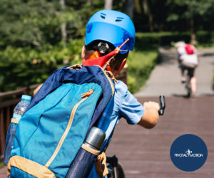 Kid riding bike to school