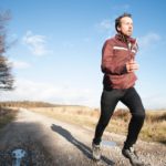 Man exercising in winter on gravel track | Featured image for What Made You Proud in 2020? blog for Pivotal Motion Physiotherapy.
