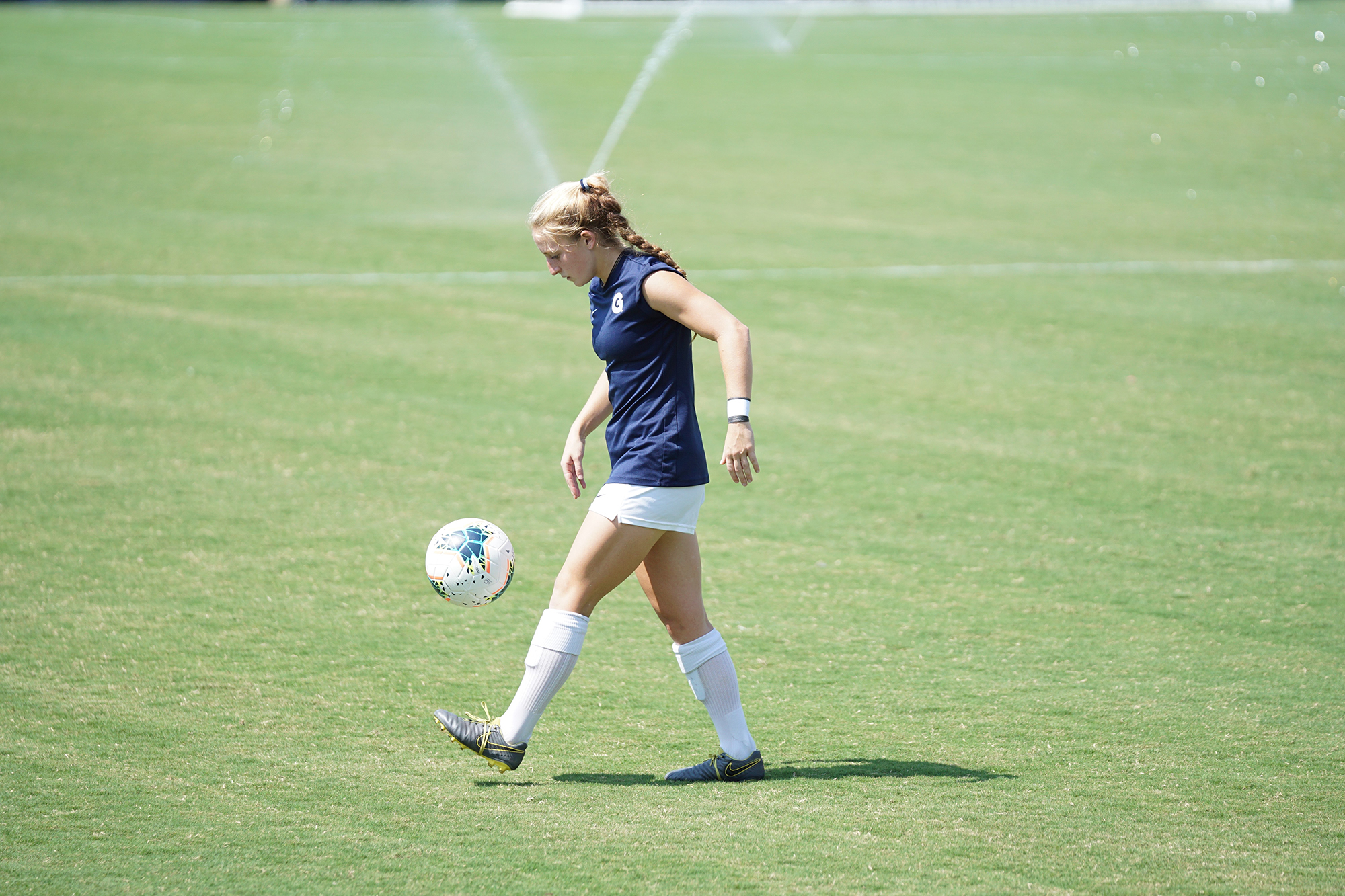 woman playing soccer