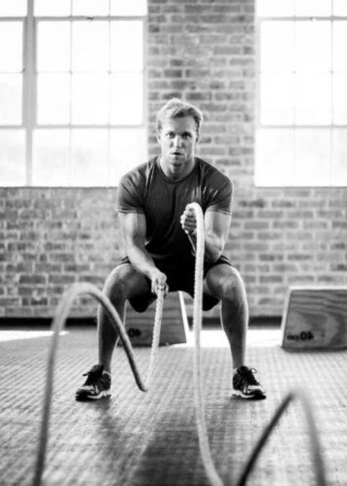 Guy doing rope exercise