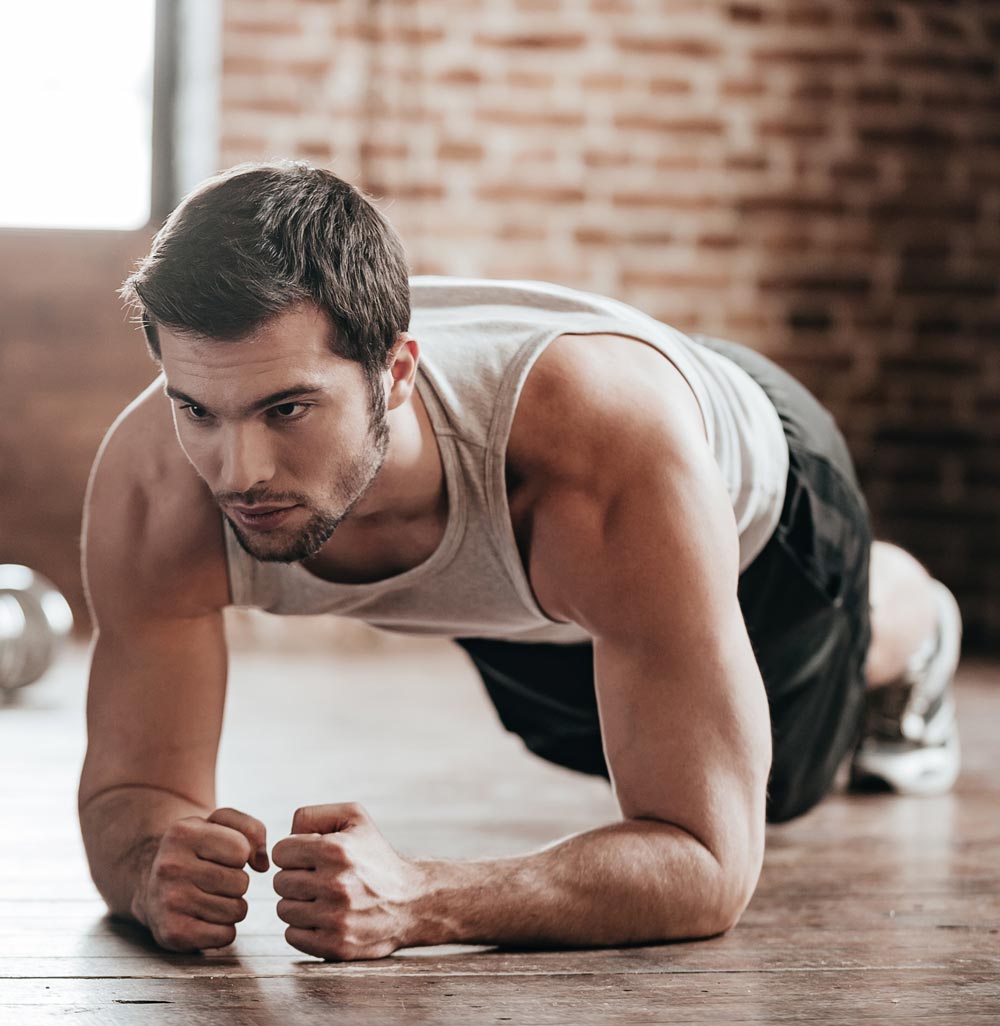 A man doing a plank | Featured image on ITB Friction Syndrome.