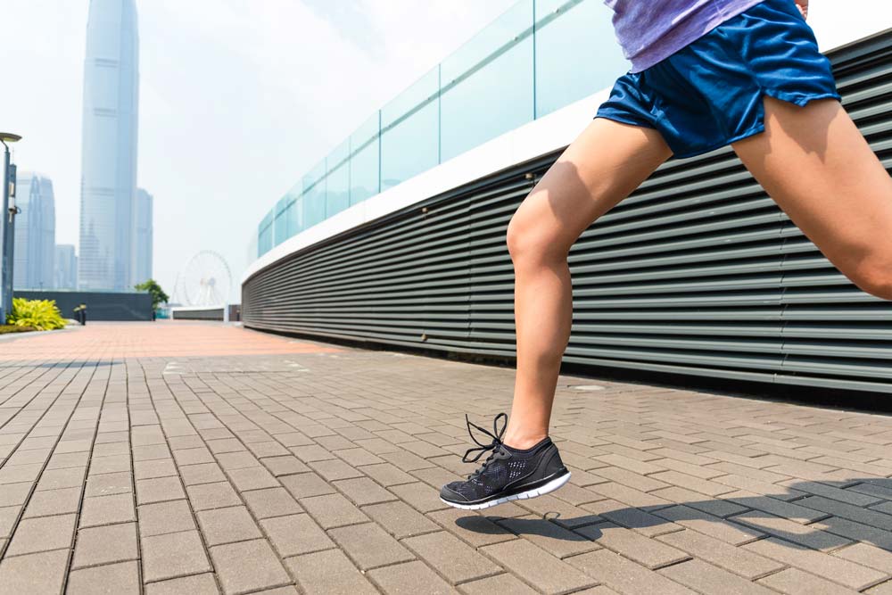 A persons legs while running | Featured image on Leg Injuries.