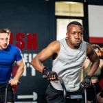 Group of people partaking in HIIT workouts | Featured Image for the HIIT Workouts – Understanding What They Are & Their Importance Blog by Pivotal Motion Physiotherapy.